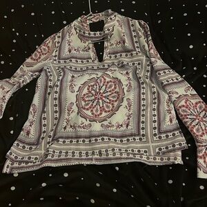 Dress or casual light shirt.Runs a little small but flows.